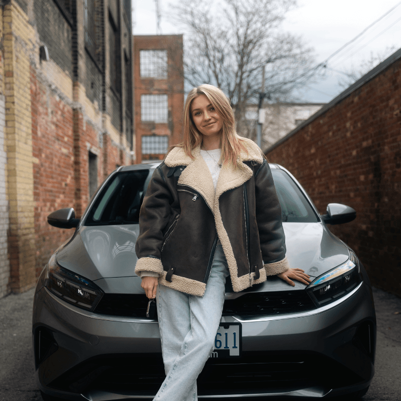 Roam customer next to a Roam vehicle