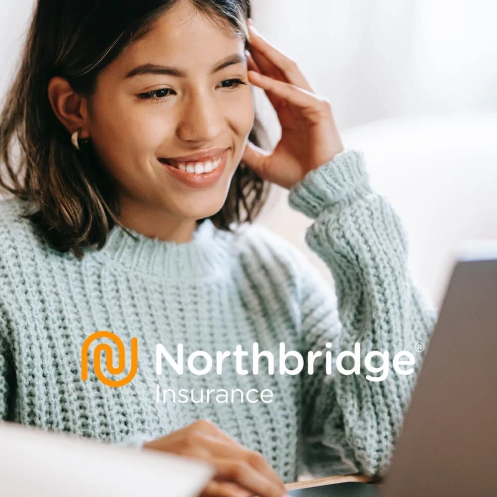 A person using a laptop with Northbridge Insurance branding on the image.
